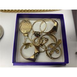 9ct gold jewellery, including three stone set rings, signet ring and a band ring, engagement ring charm, cross charm, and a locket pendant necklace, together with a silver gate bracelet, and a collection of costume jewellery and coins