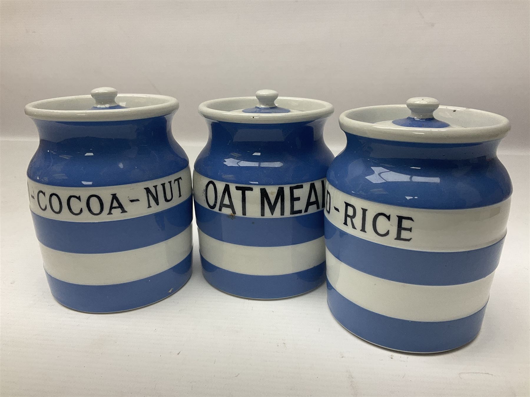 Three T.G Green Cornishware jars, H12cm