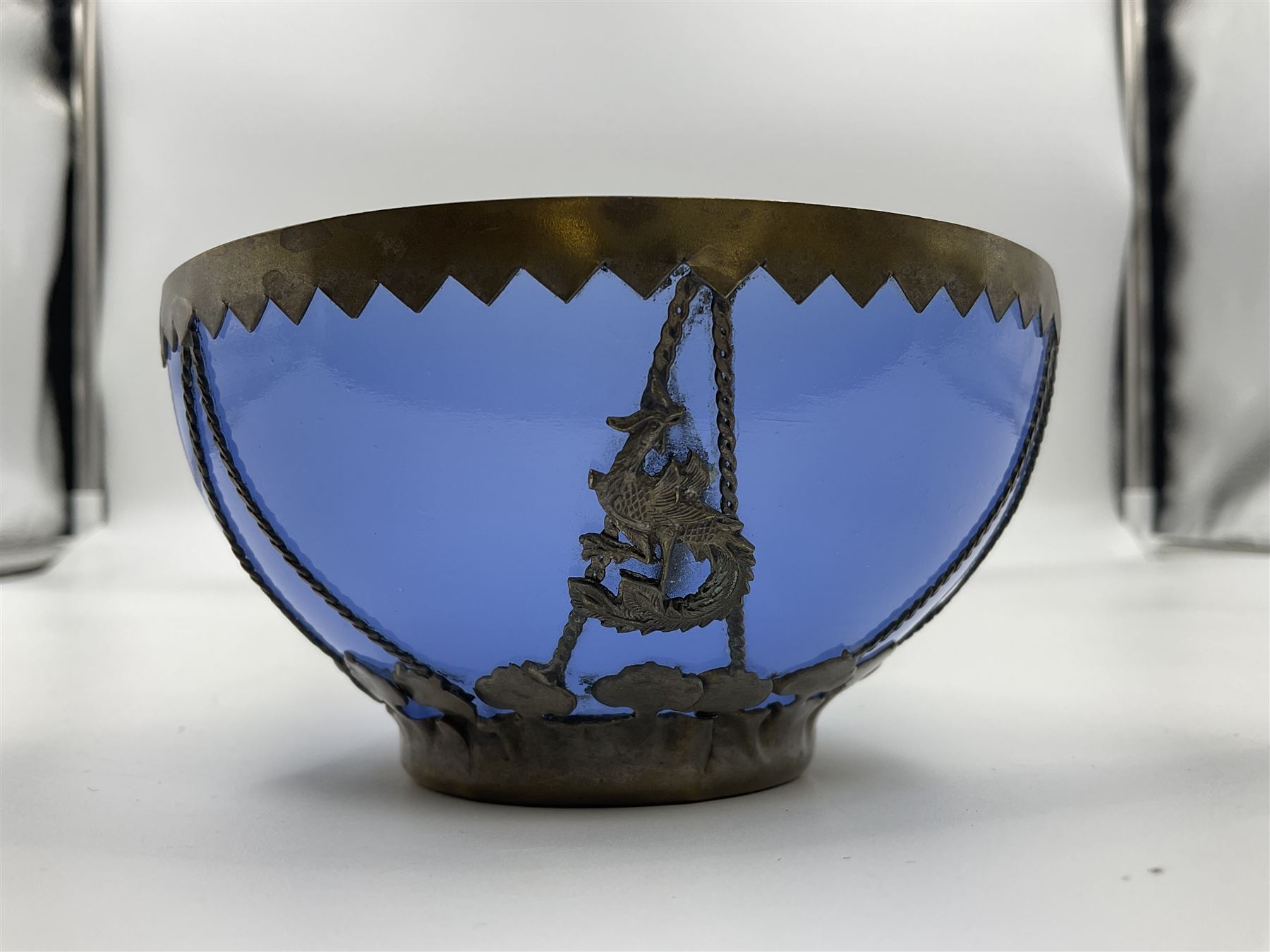 Chinese bronze vase, of baluster form with elongated neck, decorated in relief with birds amongst prunus blossom, together with a smaller pair of twin handled bronzed vases, decorated with peacocks and a blue Peking glass dish, with white metal mounted decorated with dragons, bronze vase H23.3cm