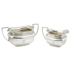 Raich Carter - presentation hallmarked silver two-handled tray of rounded oblong form with gadrooned rim by Wilson & Gill, 139 Regent Street, London, inscribed to the centre 'Presented to Mr. & Mrs. Raich Carter by the Lord Mayor of the City and County of Kingston-upon-Hull Alderman R.E. Smith J.P. on May 30th 1952on behalf of the many Admirers who subscribed to The Lord Mayor's Testimonial Fund in recognition of Raich Carter's genius as a footballer and his services to the City', London 1937 82oz L61cm; together with a hallmarked silver four-piece tea and coffee set by Cooper Bros. & Sons Ltd, the teapot of London shape with ebonised handle and knop, each piece engraved with an initial 'C', Sheffield 1920  60.5oz, teapot L29.5cm