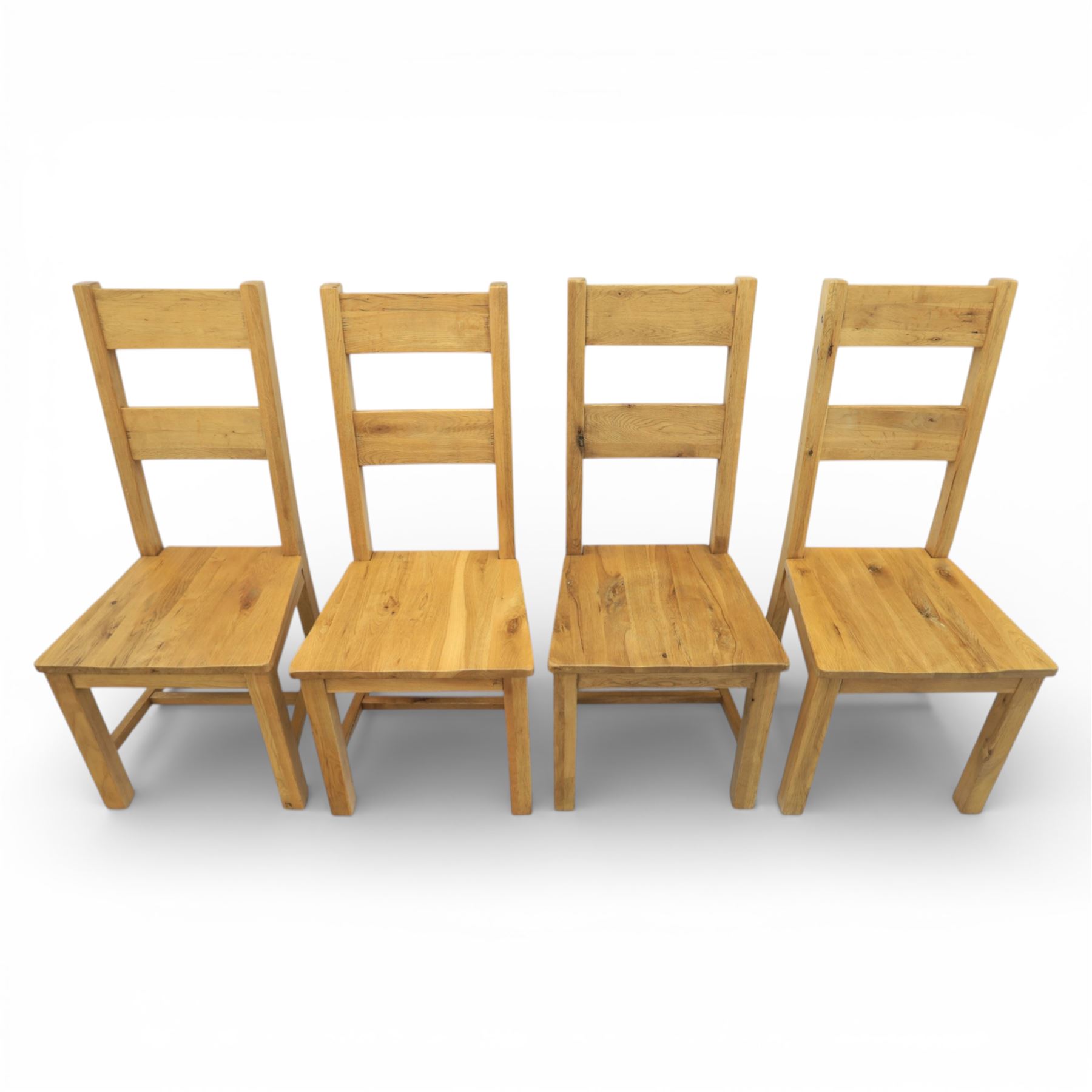 Modern light oak rectangular dining table, and eight high back chairs, stowable leaves extending to 270cm