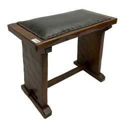 Yorkshire Oak - adzed oak plank stool with leather seat pad, splayed end supports on sledge feet joined by pegged stretcher 