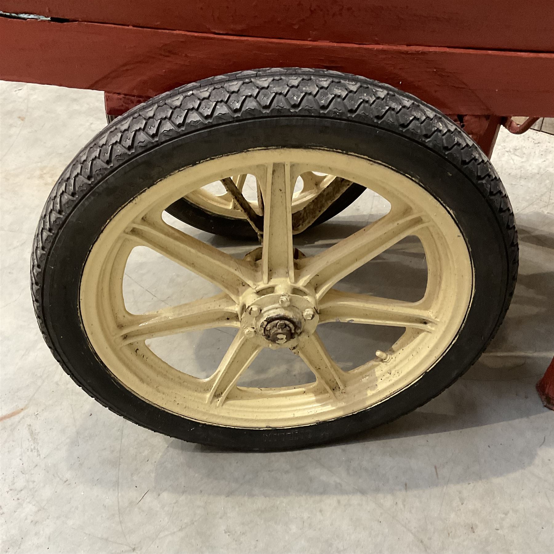 Painted timber hand cart on cast iron wheels