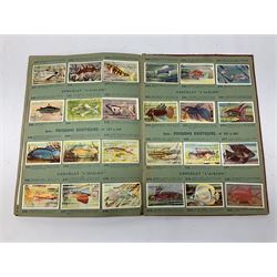 Magnus Laurie: The West Riding Territorials in the Great War. 1920: German Haus Neuerburg cigarette card album entitled Der Bunte Rock depicting 19th century military uniforms; French Chocolat Aiglon trade card album including some military costumes; and a cigarette card album, some of military interest (4)