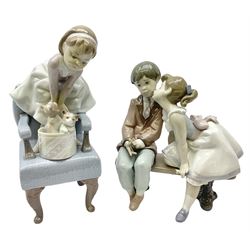 Two Lladro figures, comprising Ten and Growing no 7635 and Purrfect Friends no 6512, both with original boxes, largest example H24cm  