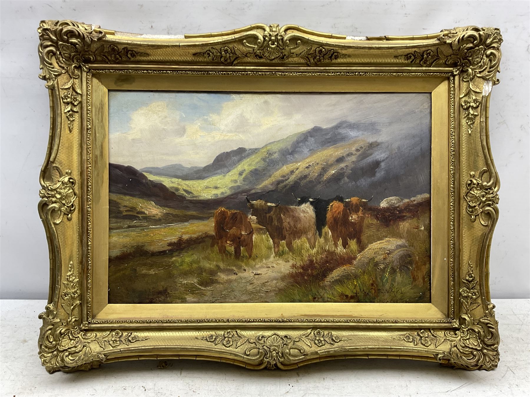 Charles W Oswald (British fl.1892-1900): Highland Cattle, oil on canvas signed 30cm x 45cm in swept gilt frame