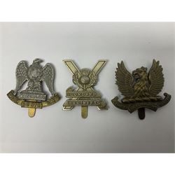 Fifteen Scottish Glengarry and other metal military badges including Argyll & Sutherland, Royal Glasgow Yeomanry, Cameronians, Lanarkshire Yeomanry, Kings Scottish Own Borderers, Highland Light Infantry, Border Regiment, Lowland Regiment, Lothians & Border Horse Yeomanry, Ayrshire Earl of Carricks Own Yeomanry etc