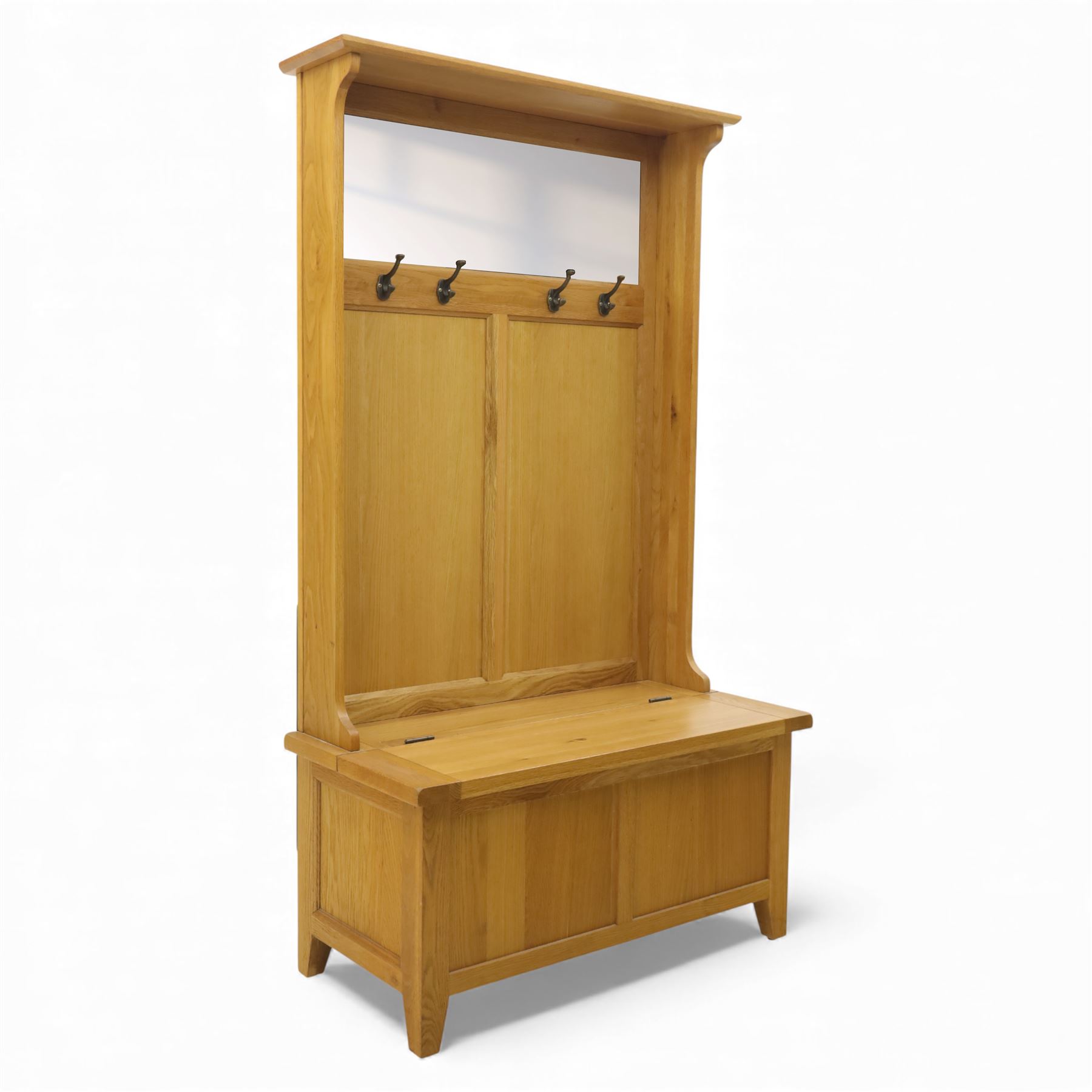 Modern light oak hall bench settle, with moulded cornice above a panelled back fitted with a row of metal coat hooks, over a hinged box seat opening to shoe storage, on tapered legs