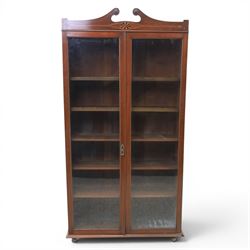 Edwardian walnut bookcase, fitted with two full height glazed doors, inlaid detail with checkered motif, adjustable shelves