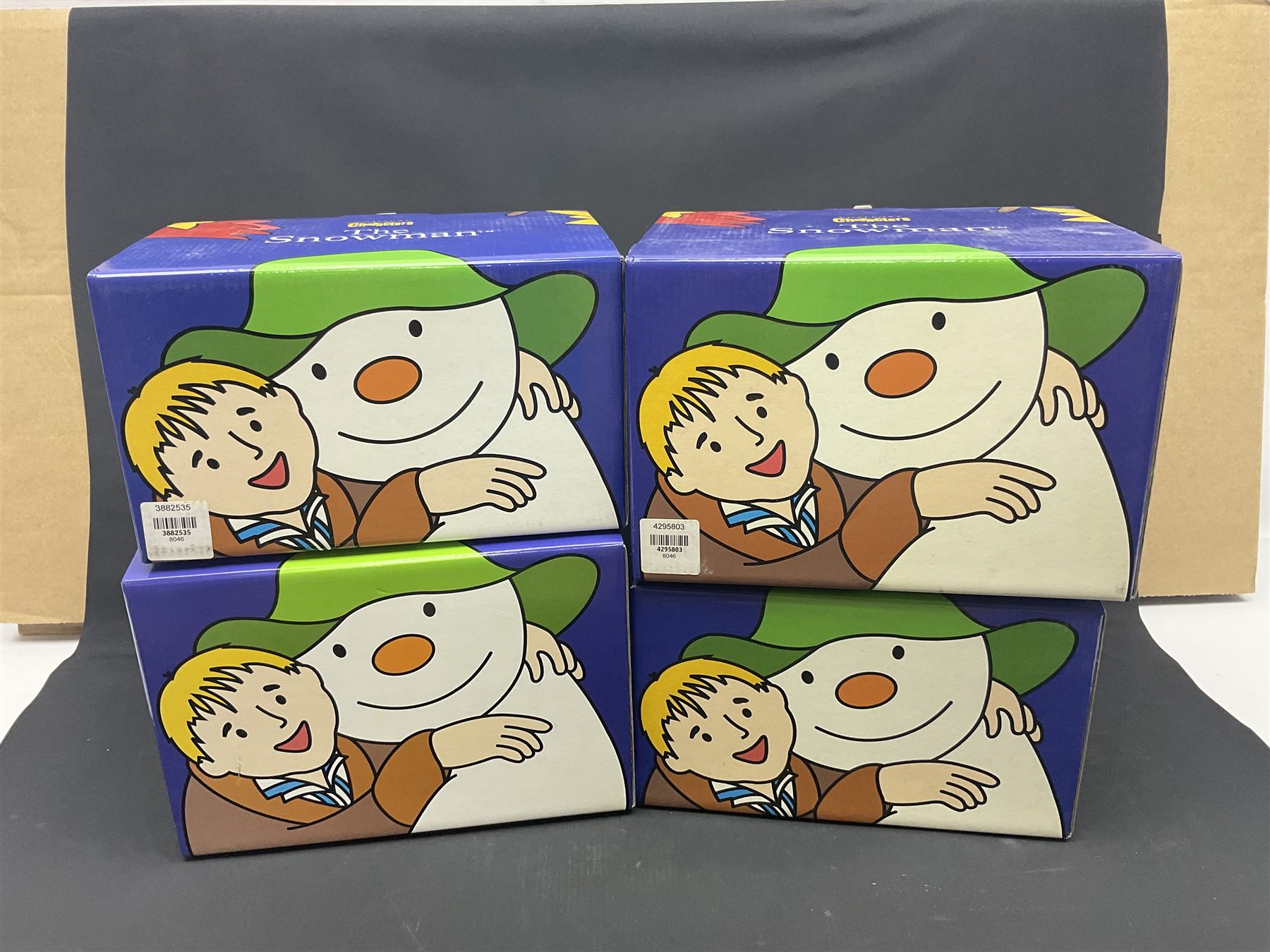 Four Coalport Characters The Snowman figures, comprising I'll Never Forget you with certificate, Pulling a Cracker and Adding a Smile, all with original boxes