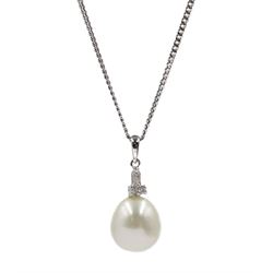 9ct white gold pearl and diamond pendant, stamped 375, on silver chain stamped 925