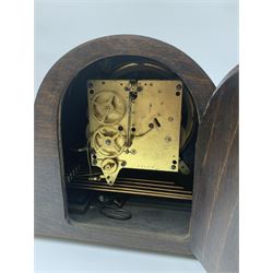 Early to mid 20th century Art Deco style walnut mantel clock and a mid 20th century oak cased mantel clock 