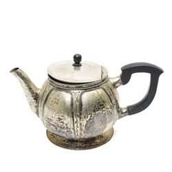 Early 20th century Arts & Crafts fruit dish by Walter Somerfield of the Leicester Art School, H16.5cm; silver plated tea service with trailing floral decoration, and various other hammered pewter items (8)