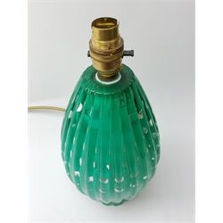 A mid 20th century Murano green glass lamp, designed by Archimede Seguso, of ovoid fluted form with controlled bubble design, including fitting H34cm
