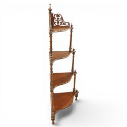 Victorian mahogany corner four-tier whatnot, shaped shelves with pierced and turned uprights, raised on turned supports