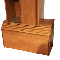 Ladderax - mid 20th century teak modular wall unit, comprising two sliding door cabinets, one fall-front cabinet, six shelves, four ladder supports and fourteen metal cross braces