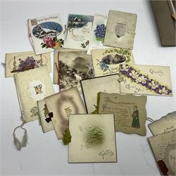 Two albums of cigarette cards, including Carreras Alice in Wonderland examples, together with vintage greetings cards, postcards, theatre stills, etc