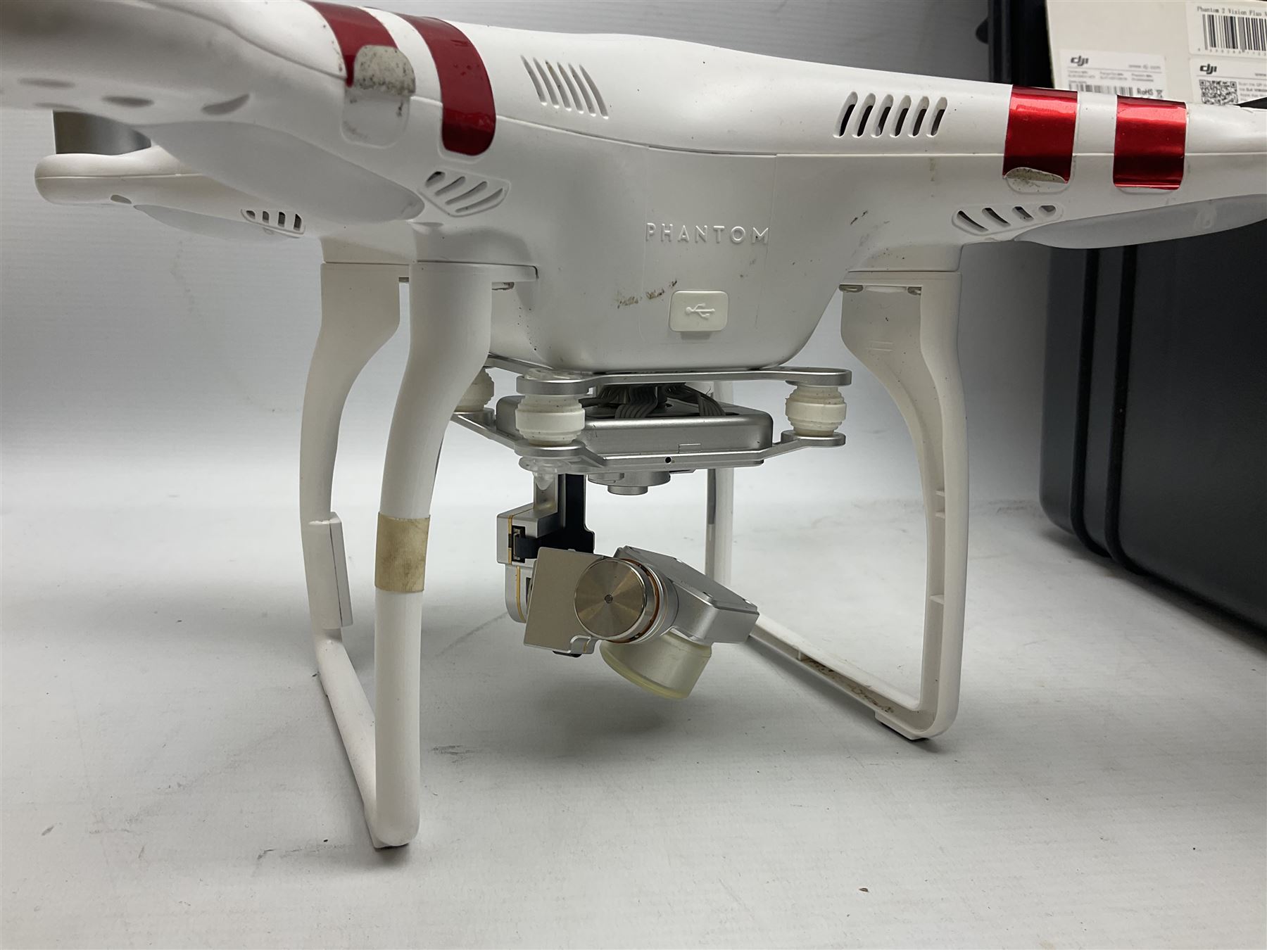 DJI Phantom 2 Vision Plus 3.0 drone, with controller, battery pack, blades, chargers and other accessories in fitted foam lined hard plastic case