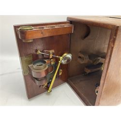 Mid 19th century brass monocular microscope by Andrew Ross, London No.180, with pitchfork base, rack and pinion focusing, revolving bed and swivelling barrel, with accessories, housed in a mahogany case with recessed carry handle and lockable doors