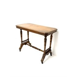 Late Victorian oak side table, moulded top, bobbin turned supports and stretcher, shaped feet and castors