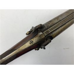 19th century 13-bore double barrel side-by-side percussion cap shotgun, the 72cm stub twist damascus barrels with ramrod under, walnut stock with chequered grip L117.5cm overall