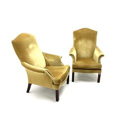 Pair Parker Knoll armchairs, upholstered in mustard yellow, square shaped supports