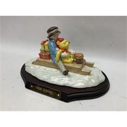 Nine Royal Doulton Winnie the Pooh Collection figures, including Oh Dear Bath Time's Here, Going Sledging, Tigger's Splash Time and Christopher Robin, together with a Royal Doulton Disney Showcase Jiminy Cricket figure, all boxed