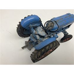 Chad Valley - two unboxed and playworn large scale Fordson tractors - No.9235 Fordson Major Tractor, dark blue diecast body, orange wheels, crank handle clockwork mechanism and 'Firestone' rubber tyres; and No.M59 New Fordson Major Tractor, blue diecast body, tinplate hinged bonnet, orange wheels and clockwork motor contained in rear wheel hub (2)