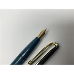 Three fountain pens, to include Conway Stewart 'Dinkie 550' and 'Conway 57' and a Parker 'Slimfold', all with 14ct gold nibs, together two roller ball pens, including a Parker example and a Swarovski Crystal paperweight