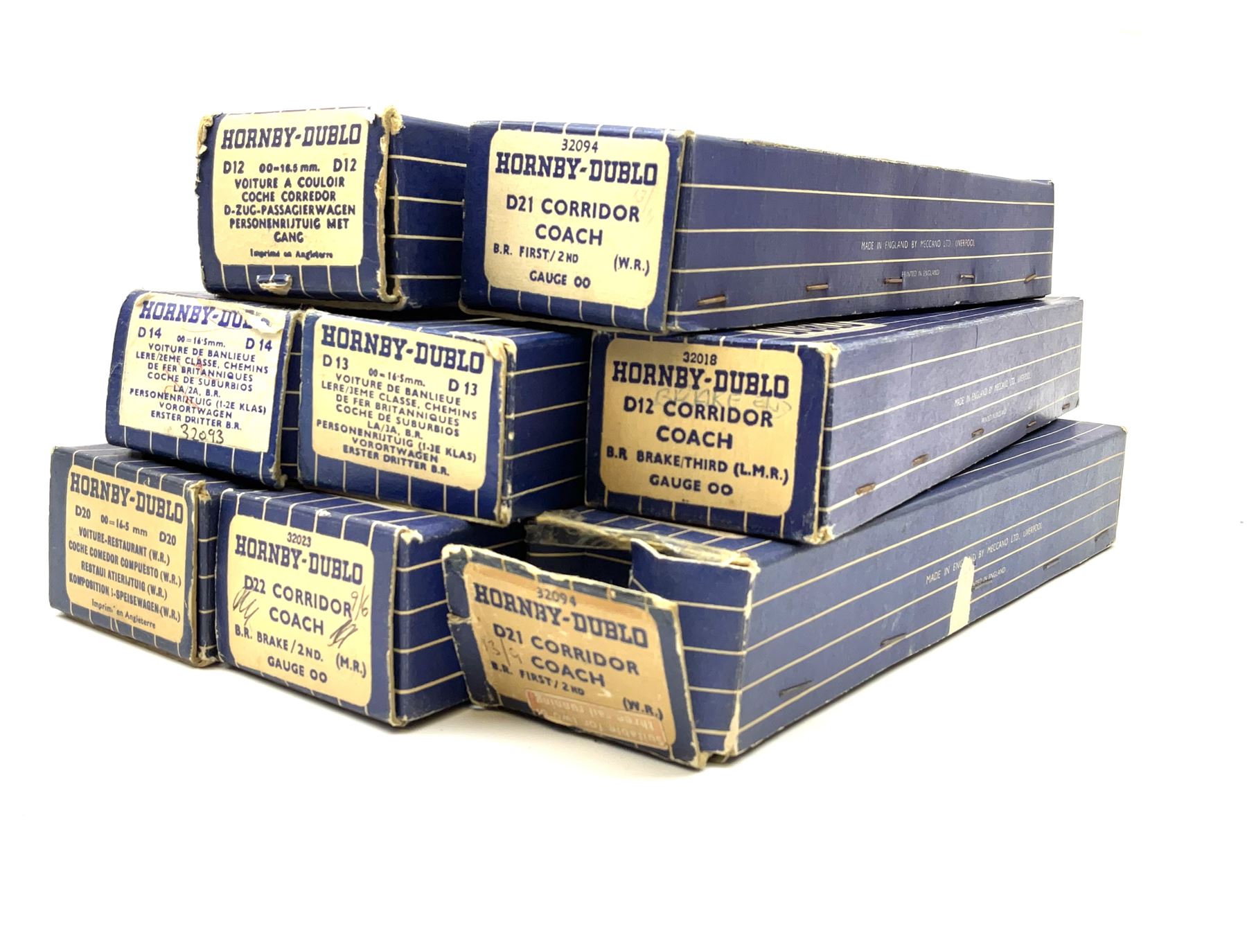 Hornby Dublo - eight coaches comprising D12 First L.M.S.; 32018 D12 Corridor Coach B.R. Brake/3rd (L.M.R.); 32090 D13 Suburban Coach First/Third B.R.; 32093 D14 Suburban Coach Brake/Third B.R.; 32096 D20 Composite Restaurant Car (Western Region); two 32094 D21 Corridor Coach B.R. First/2nd (W.R.); and 32023 D22 Corridor Coach B.R. Brake/2nd (M.R.); all in boxes (8)