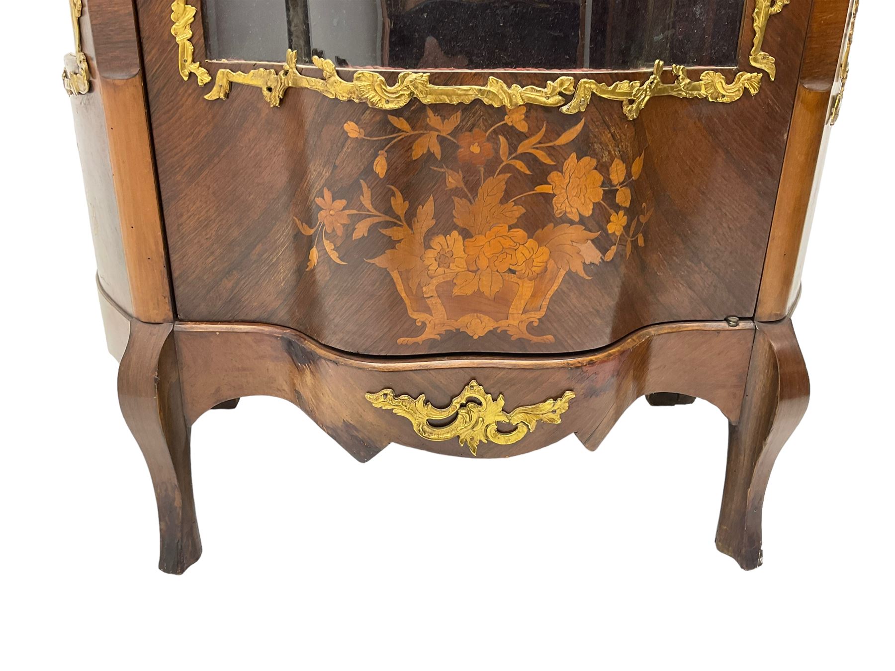 Early 20th century French kingwood vitrine or display cabinet, decorated with applied foliate cast band, serpentine glazed door and sides, inlaid with marquetry decoration of floral bouquets and branches, cartouche mounts to the apron, raised on cabriole supports