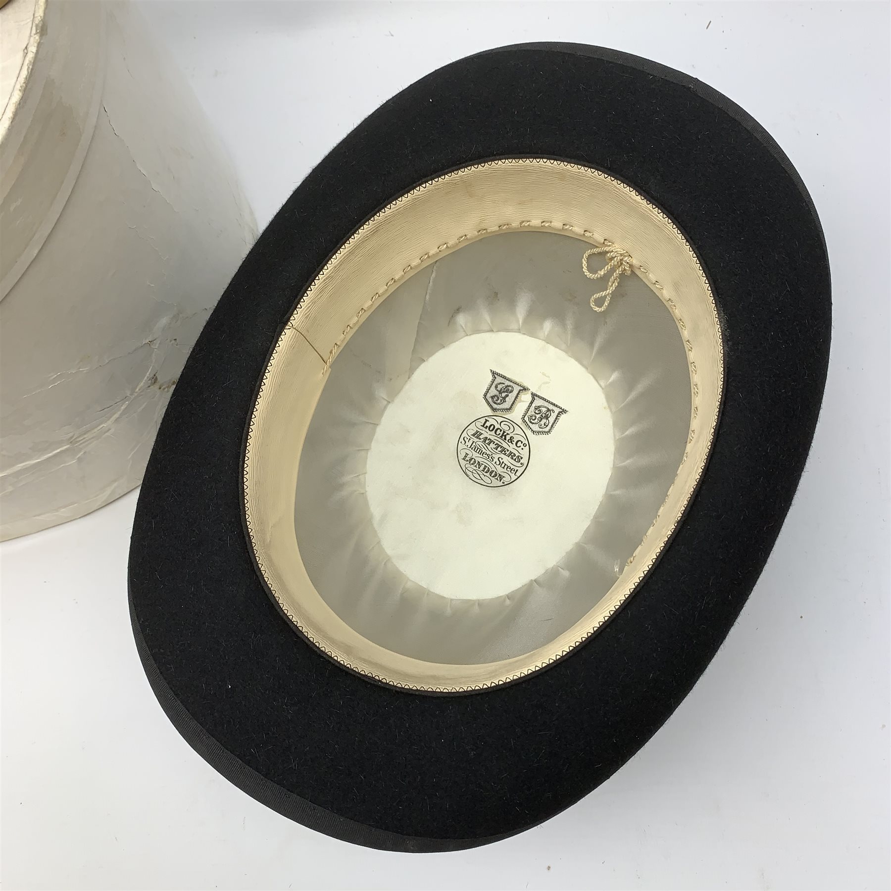 A boxed Lock & Co Hatters St James St London bowler hat, together with a set of Salters cast iron scales with circular brass dial inscribed 'Salters Improved Family Scale, No 50', an early 20th Century Improved Earthenware Inhaler manufactured by S Maw & Son, and a Dr Nelson's Improved Inhaler with stopper. 