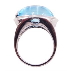 18ct white gold cabochon blue topaz ring, with heart shaped gallery, stamped 750