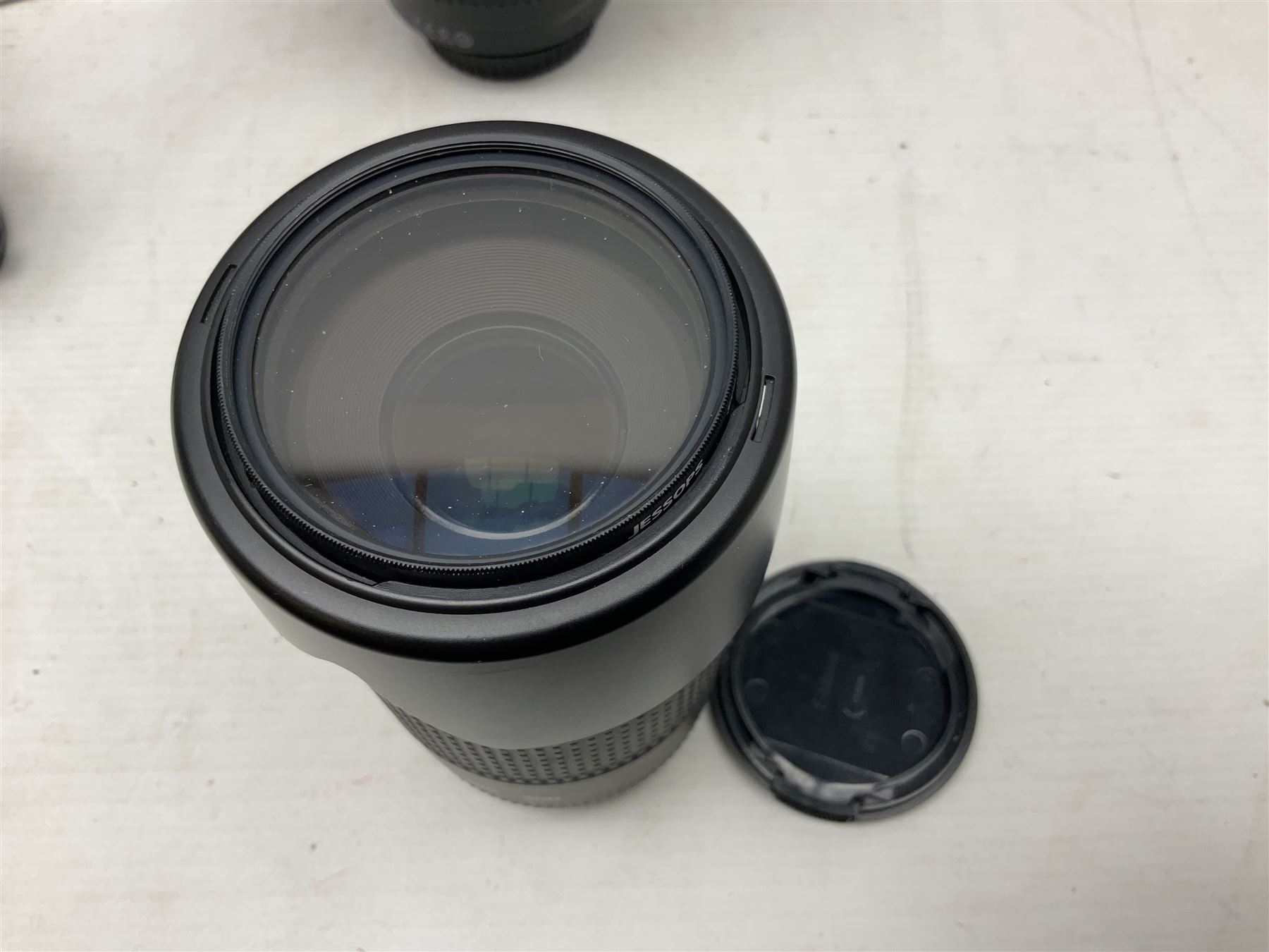 Canon Eos 7D camera body, serial number 3261306344, with 'Canon Ultrasonic EF 24-105mm Macro 0.45m/1.5ft Ultrasonic' Lens, 'Canon Zoom EF 75-300, 1;4-5.6 III' lens and Teleplus Pro 300 lens, together with tripod and original camera box 