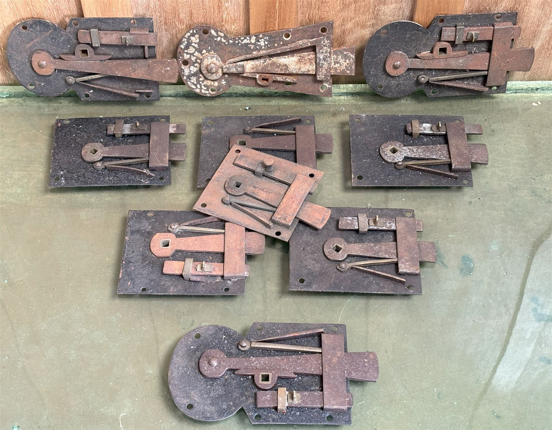 Group of ten early 20th century iron attic door latch plates, some of key hole form. (10)  - COLLECTION BY APPOINTMENT FROM: The White House, Thirsk Road, Easingwold, York, YO61 3NF - CALL 01723 507111 TO ARRANGE