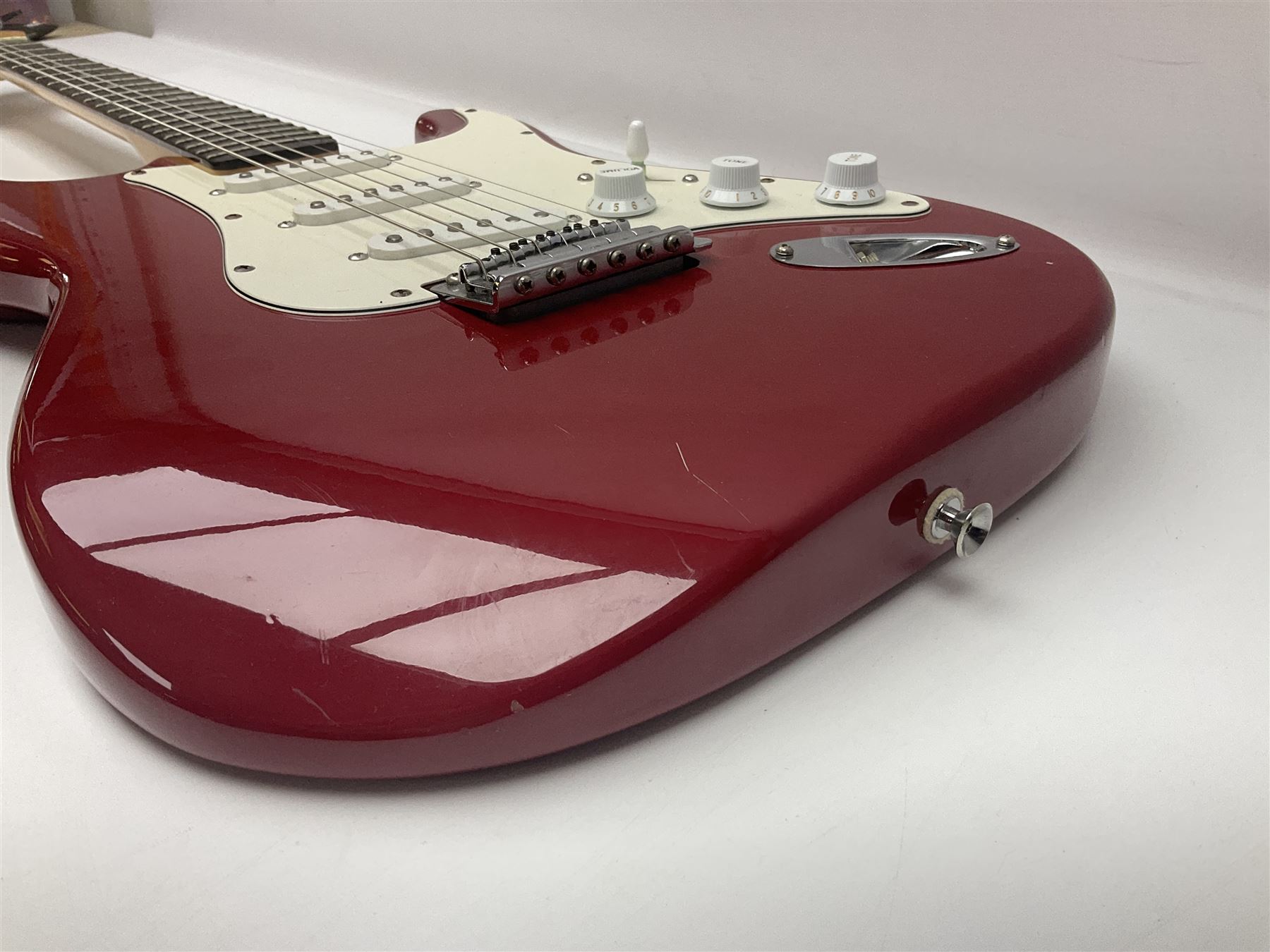 1990s Korean Squier Fender Stratocaster electric guitar in cherry red; serial no.S965951, L98cm