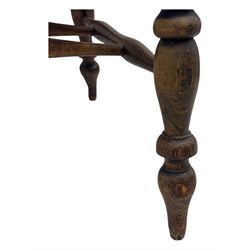 19th century elm and beech smoker's bow armchair, shaped arms over turned spindle gallery and dished seat, on turned supports united by double H-shaped swell turned stretchers 