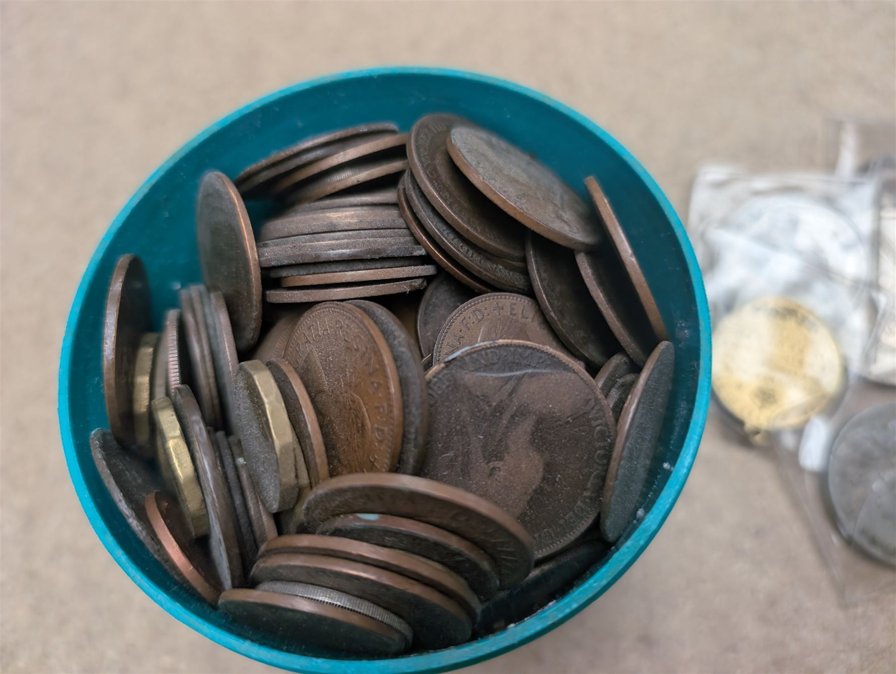 The Birmingham Mint International Formula 3 silver ingot, hallmarked, pair of sovereign scales, two silver fobs and others, etc and a collection of Great British coins