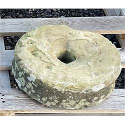Small 19th century stone mill wheels