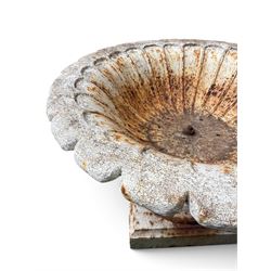 Coalbrookdale - pair of 19th century cast iron petal rim urns, squat form on square plinth, finished in distressed white paint, design registration number 133334, first registered 19 september 1860, number 19 in the Coalbrookdale Castings Catalogue (see illustration)
