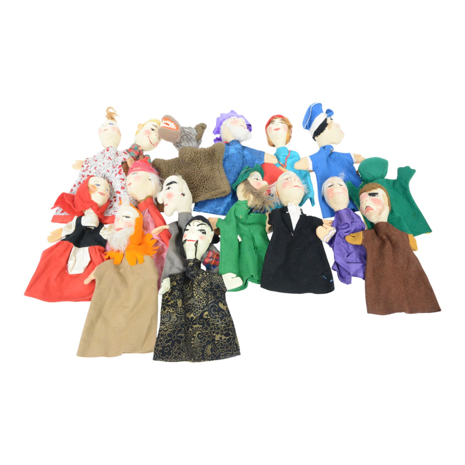 Collection of Kersa and similar German hand puppets, depicting various characters with felt faces with stitched and painted details
