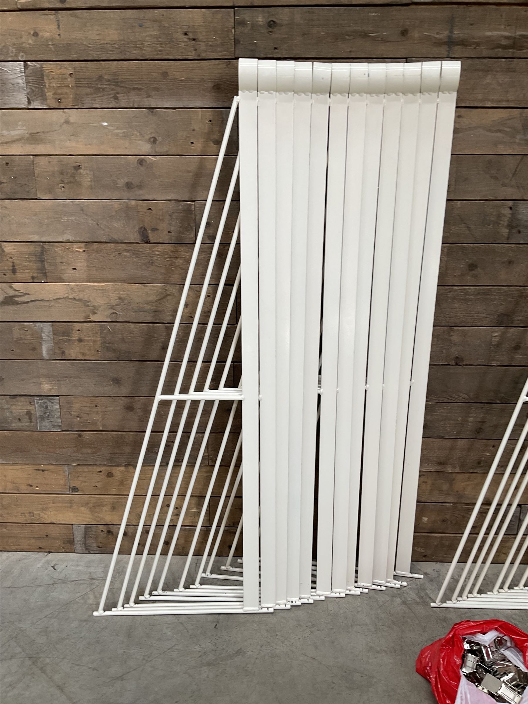 Commercial wall hanging rug display rack