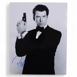 Collection of James Bond related signed film stills and promotional photographs, including Sean Connery and Pierce Brosnan promotional shots, Desmond Llewelyn, Octopussy poster, John Glenn, Blanche Ravalel, Geoffrey Holder and Julian Glover, all with certificates of authenticity