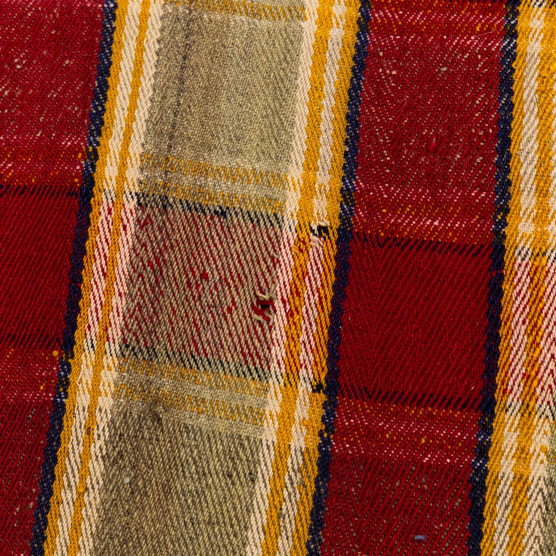 South West Persian Jajim flatweave kilim, field with alternating vertical bands of red, yellow, navy and pale green, decorated with geometric and polychrome raised pile accents, fringe ends 
