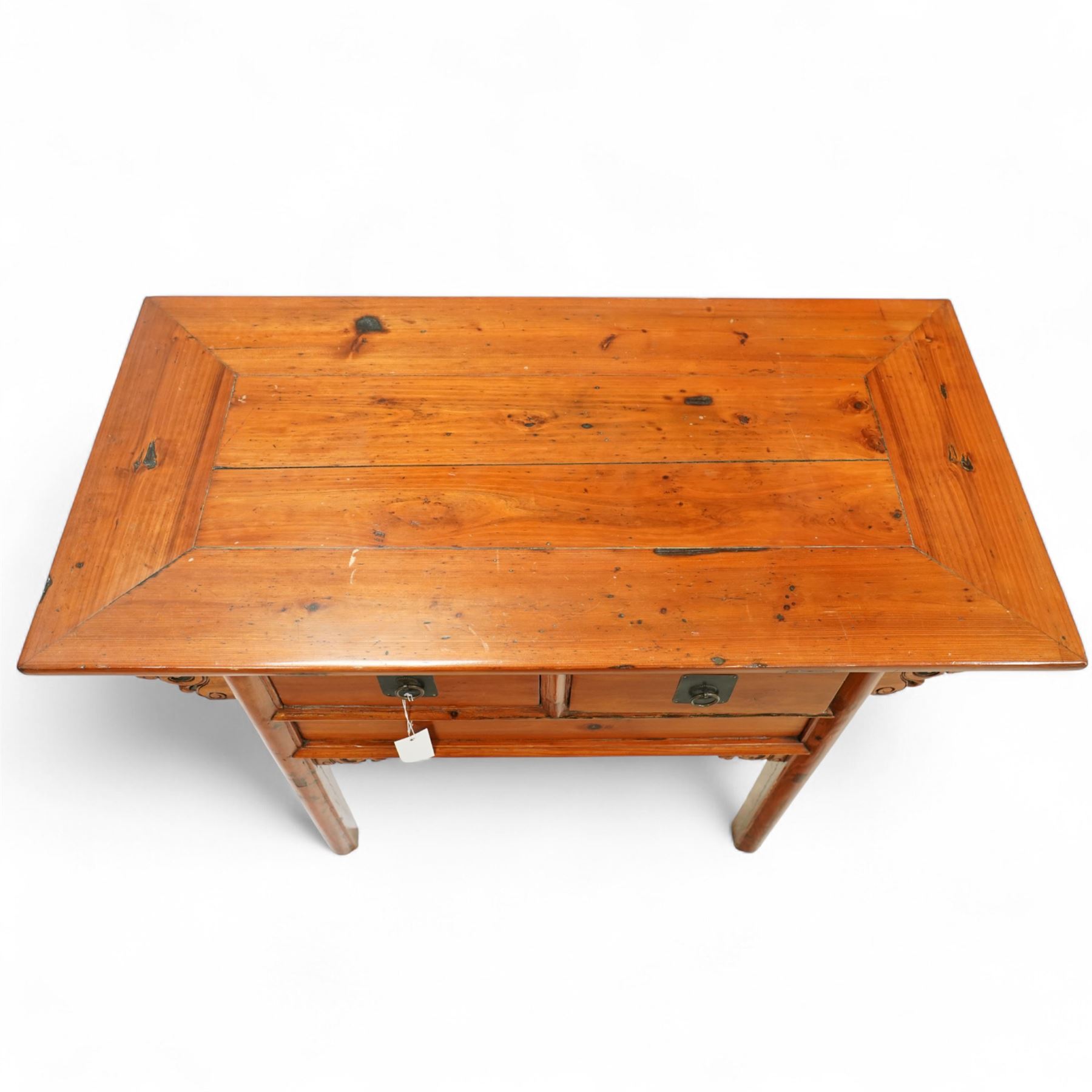 Late 20th century, Chinese elm low table, rectangular to over two drawers, decorated with floral carved brackets 