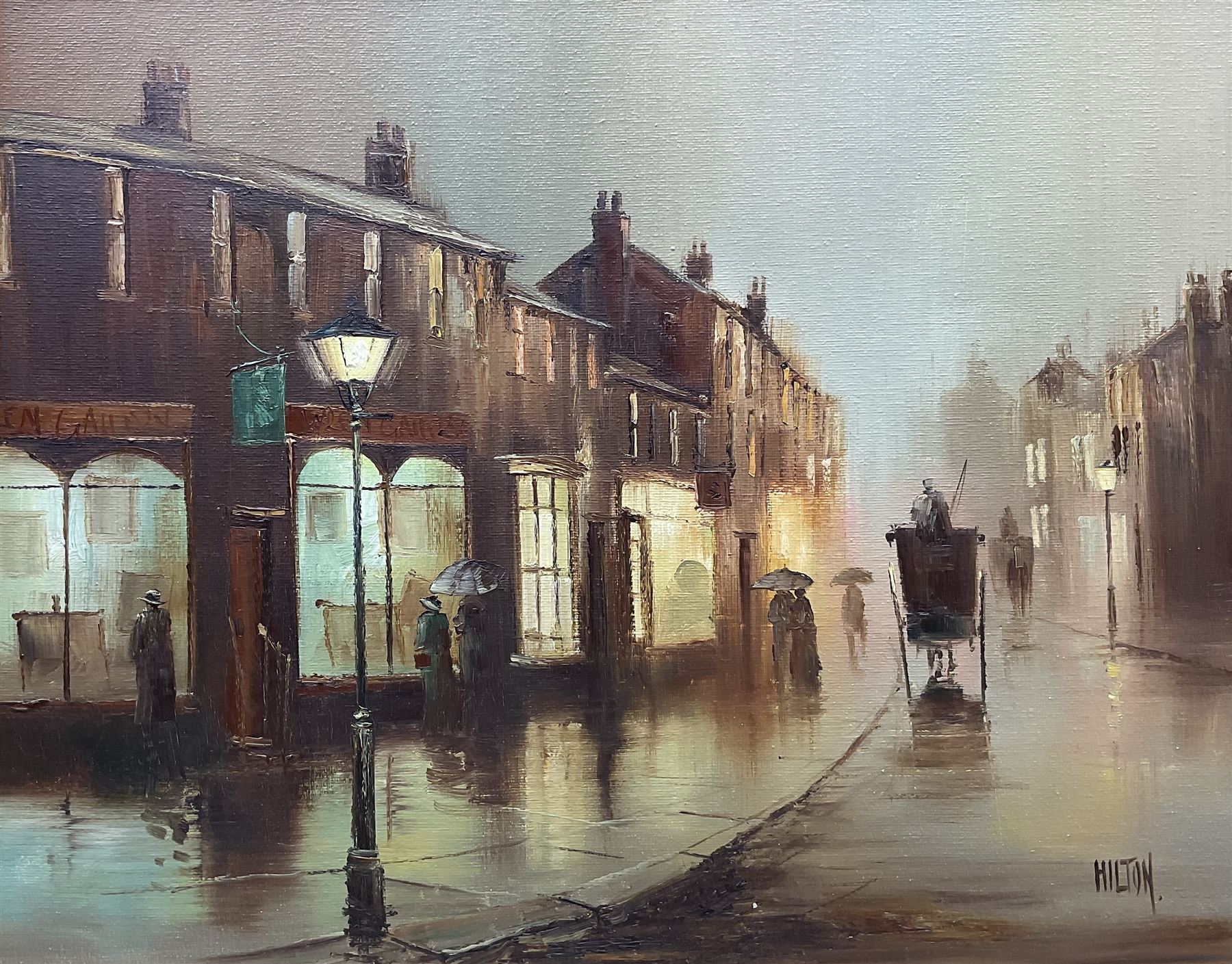 Barry Hilton (British 1941-): Edwardian Street Scene at Night, oil on canvas signed 39cm x 49cm 