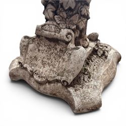 Pair of weathered composite stone garden figures, modelled as a girl and a young satyr playing the panpipes seated on column supports, the fluted columns with climbing ivy vines and surmounted animal, butterfly and other zoomorphic motifs