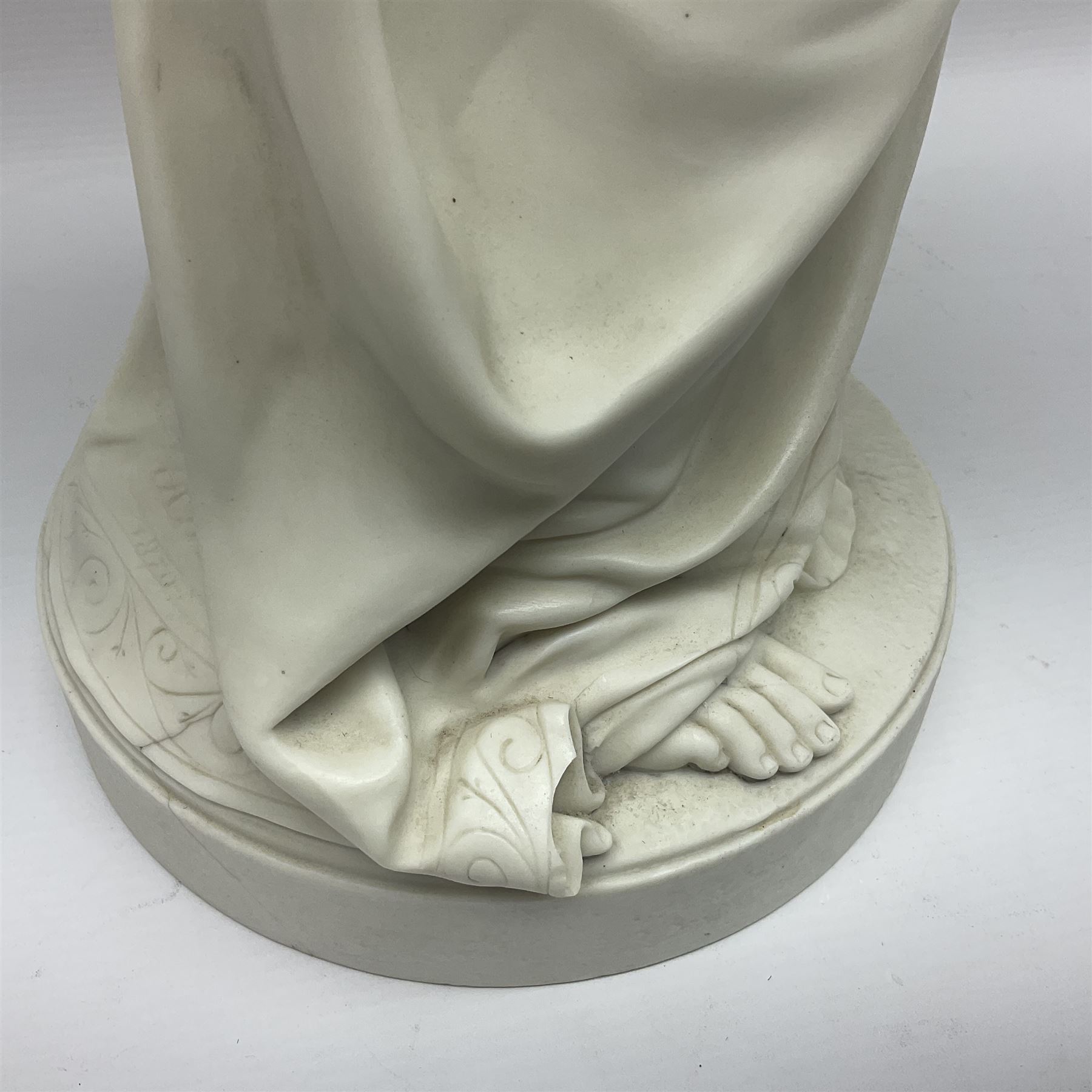 19th century Copeland Parian Ware figure, after R Monti, modelled as Lady Godiva, upon a circular titled plinth, signed and dated verso R Monti 1870, impressed to base Copyright Reserved Copeland, overall H22cm