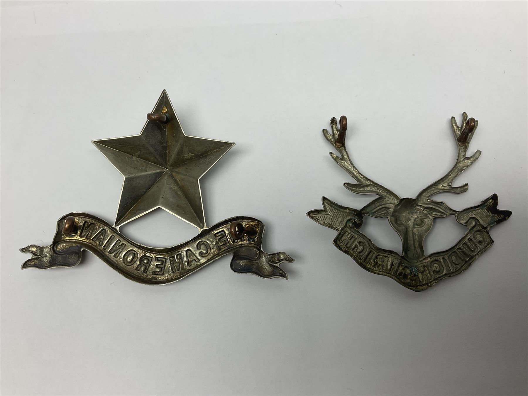 Thirteen Scottish metal Glengarry badges including Black Watch, Highland Regiment, Cameronians, Argyll & Sutherland, Seaforth Highlanders, Kings Scottish Own Borderers etc