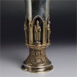 Modern limited edition silver goblet, 'made by order of the Lord Bishop of Ripon to commemorate the foundation of the Diocese in 1836', designed by Hector Miller for Aurum, the plain fluted cup, upon an ornate figural parcel gilt stem and stepped circular foot, no. 112/500, hallmarked Hector Miller, London 1985, H17cm, with certificate